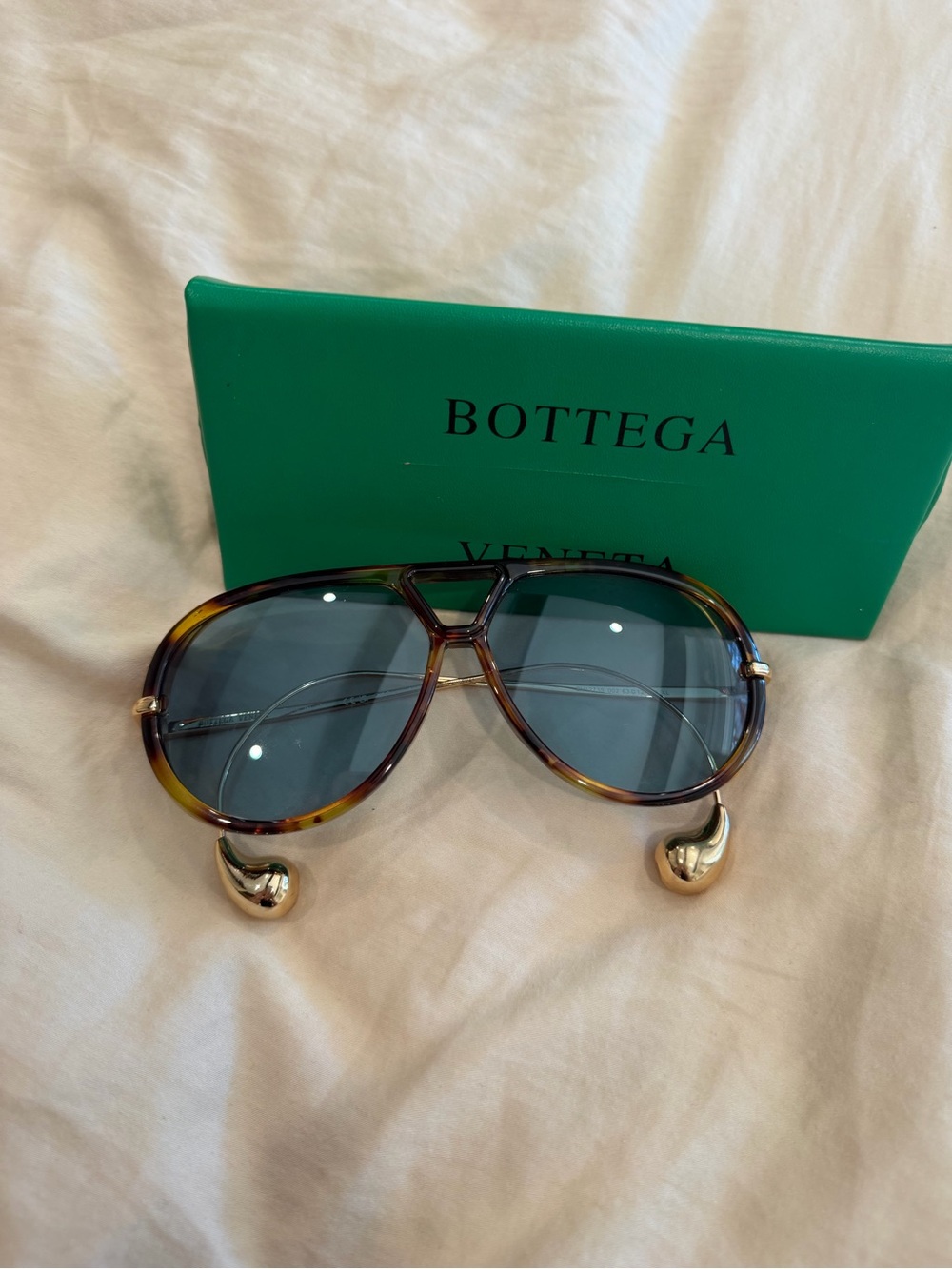 Bottega Veneta Tortoise Shell Sunglasses with Blue Lenses and Gold Accents